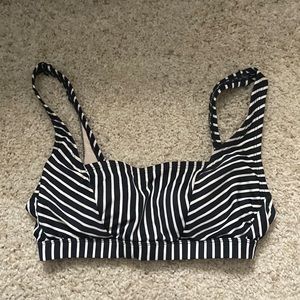 black and white striped swim top.